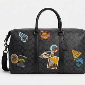 Coach Venturer Duffle Bag In Signature Canvas W/ Patches Gunmetal/Charcoal / NY